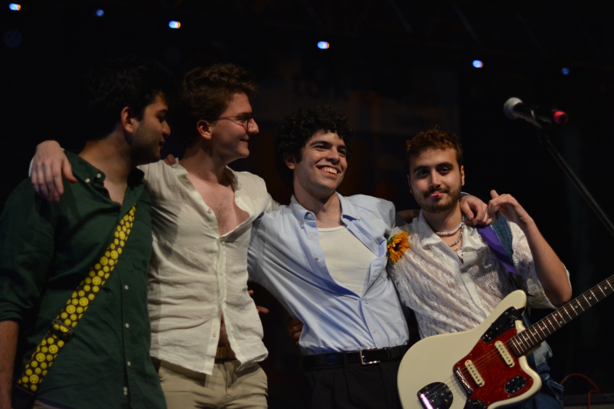 The members of somon together onstage after their latest concert